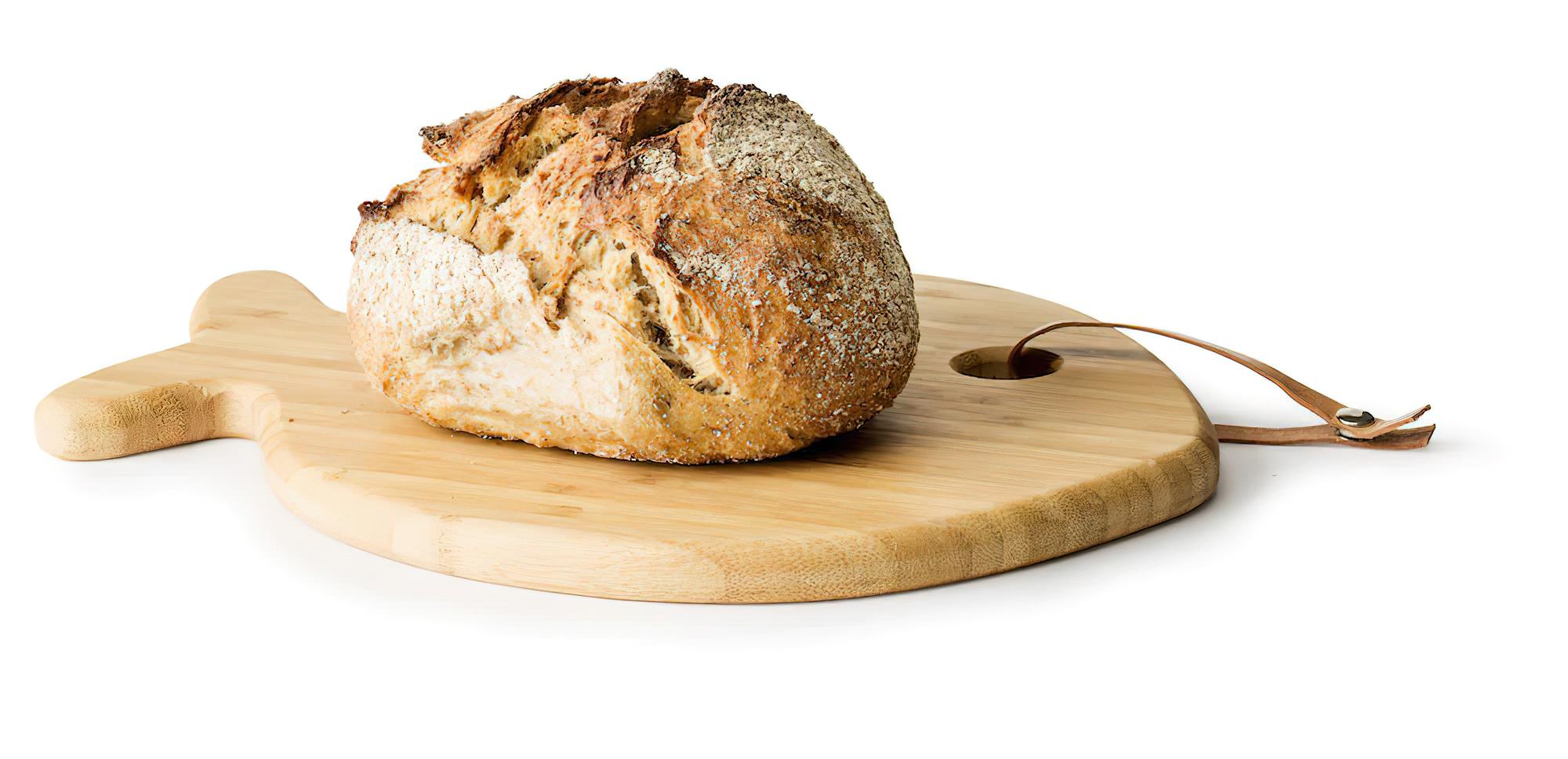 Wooden board with fresh baked bread